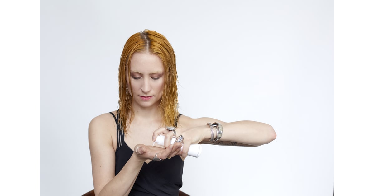 Distribute two to four pumps of a styling cream, such as Hairstory’s