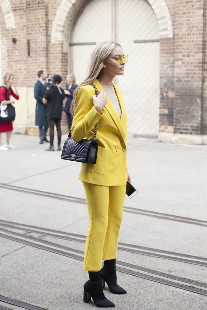 Shades that match your bold suit make for an outfit that's like street style catnip.