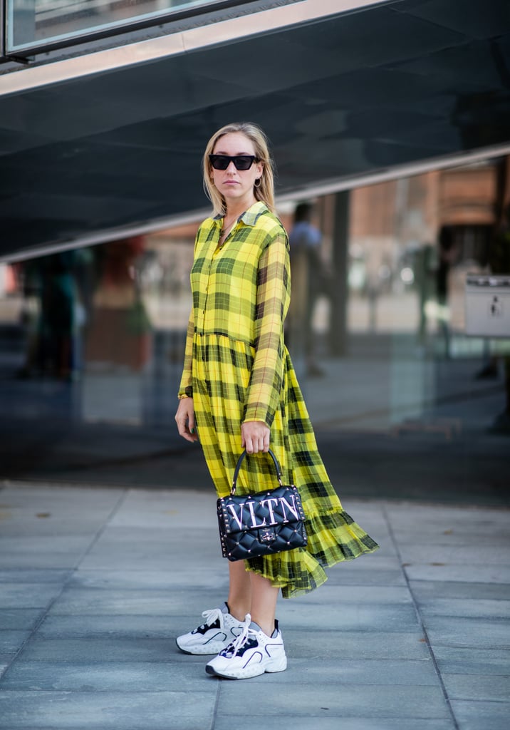 Just two pieces and you're ready — throw on a midi dress and dad sneakers that can handle some puddle jumping.