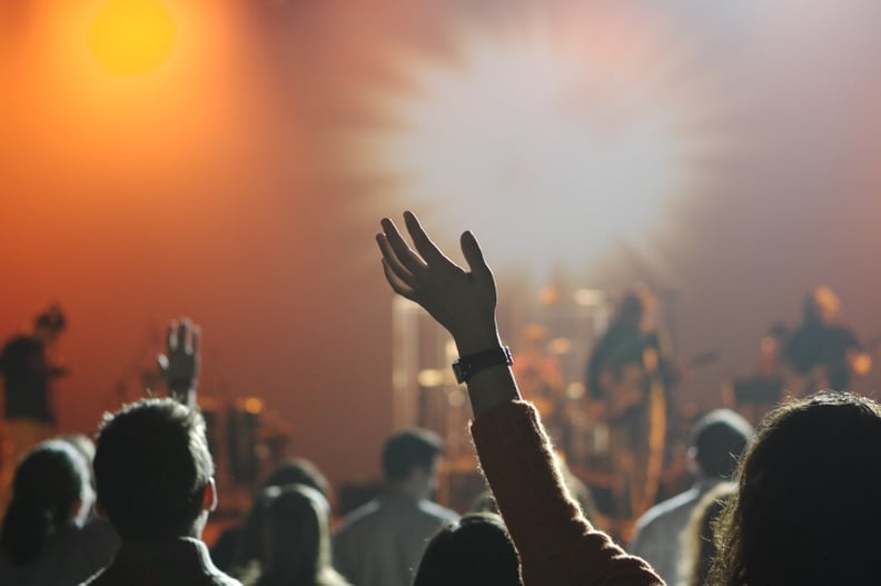 Crowd Surf at a Concert