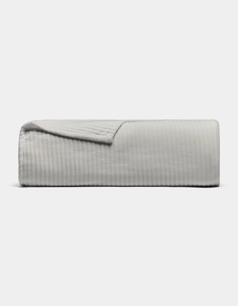 Cozy Earth Bamboo Coverlet ($83, originally $128)
Instead of constantly changing your bedding based on the seasons, opt for a blanket that can last you throughout the year. This bamboo coverlet is the perfect layering piece thanks to its soft, breathable fabric. At 35 percent off, we wouldn't blame you for stocking up on multiple shades and sizes.