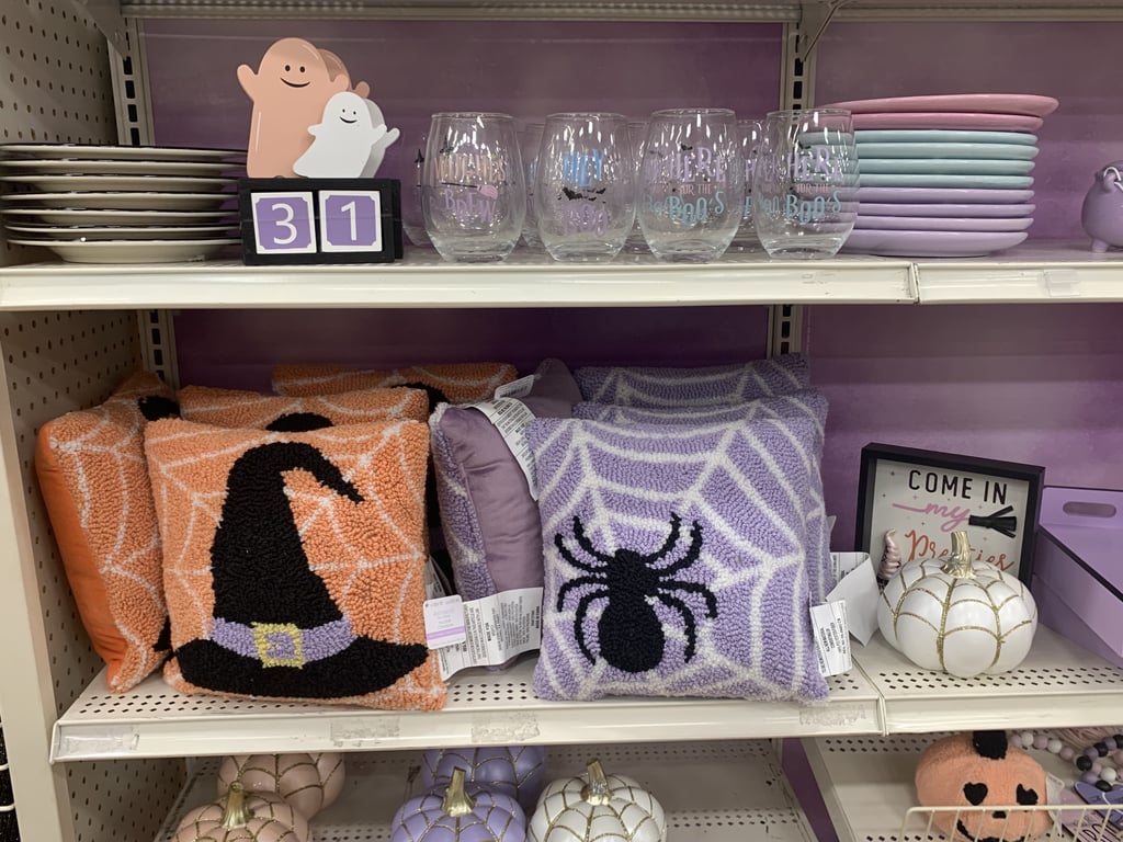 Of course, the Halloween decor collection includes fuzzy pillows and sparkly pumpkins, because everything is better with glitter.