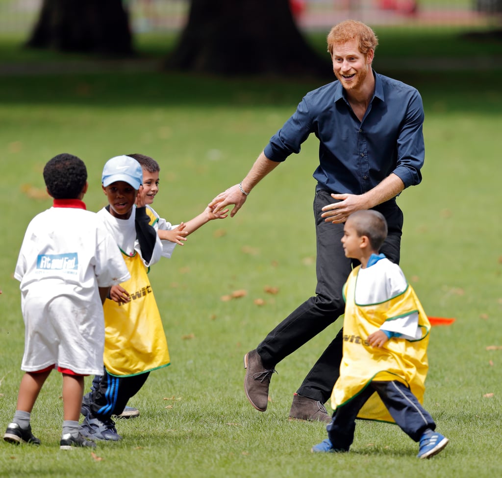 Prince Harry adorably played ball with children.
