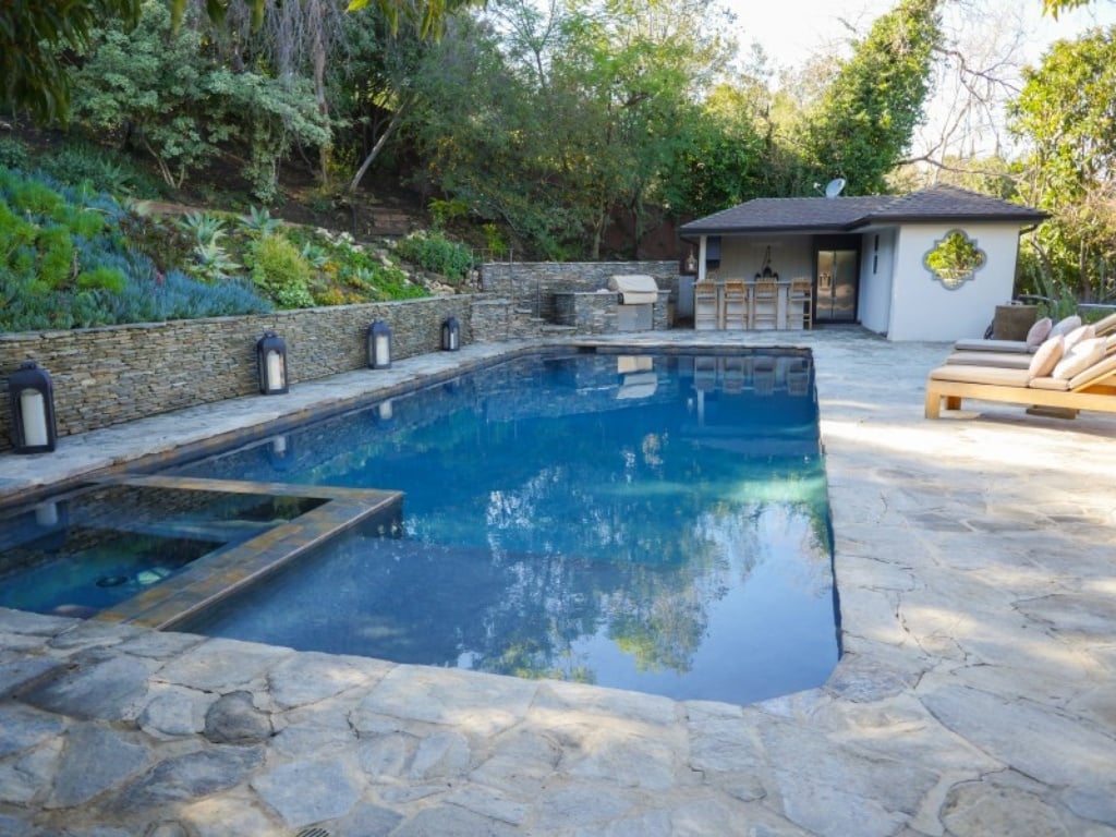Not only is there a saltwater pool, there's a built-in barbecue as well. 
Source: Sotheby's Realty
