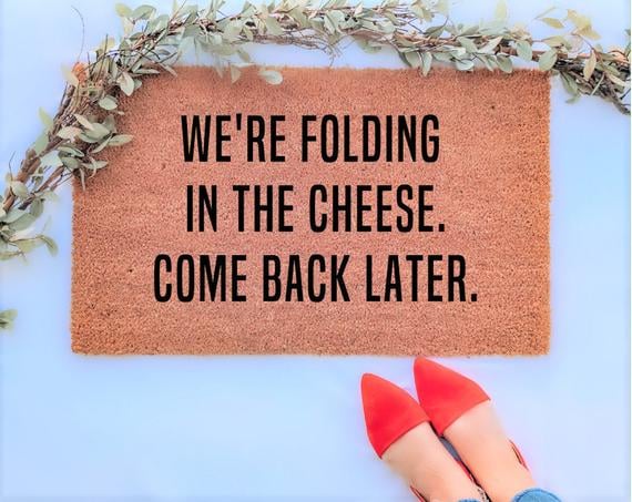 We're Folding In the Cheese Doormat