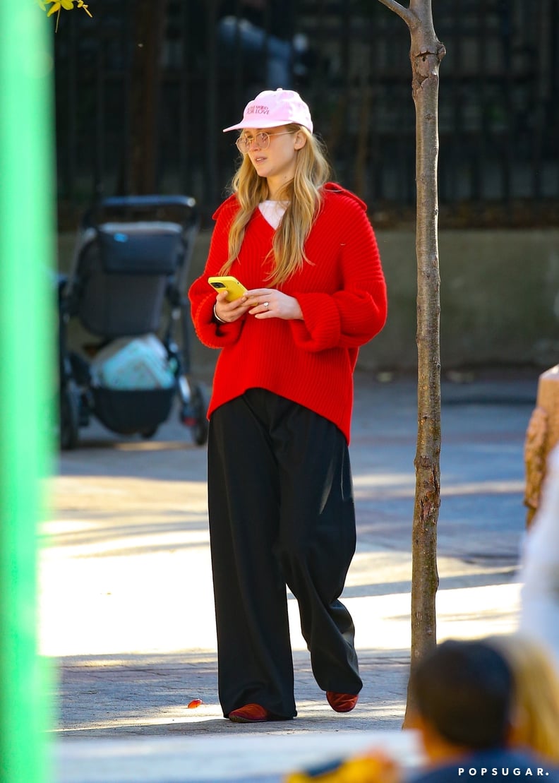 Jennifer Lawrence Wears a Red Sweater and Baseball Cap in NYC