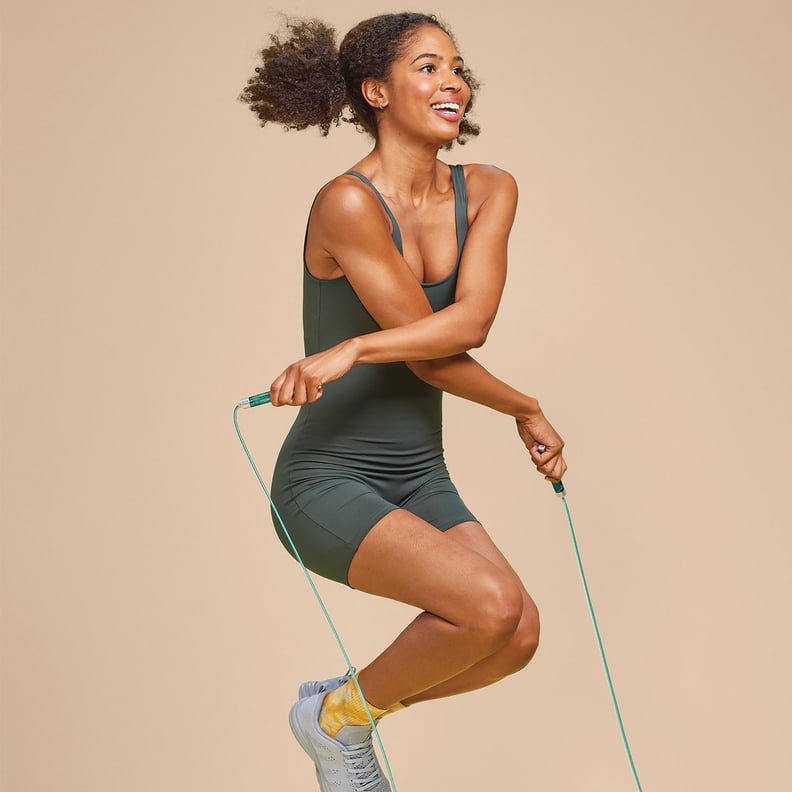 Premium Photo  Female athlete exercise with a jump rope in gym