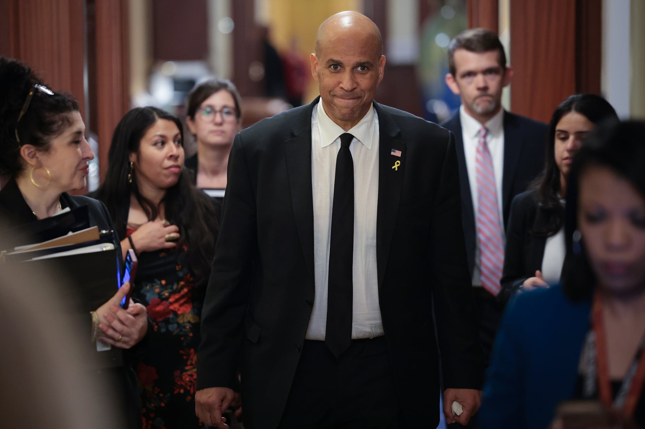 WASHINGTON, DC - APRIL 01: U.S. Sen. Cory Booker (D-NJ) walks toward reporters after delivering a record setting floor speech for the U.S. Senate at the U.S. Capitol on April 01, 2025 in Washington, DC. Booker spoke for over 25 hours, protesting President Trump's agenda on the Senate floor, breaking a record set by Sen. Strom Thurmond's 24 hour, 18 minute filibuster against the Civil Rights Act in 1957. (Photo by Win McNamee/Getty Images)