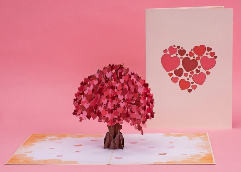 弹出一个漂亮的卡片:纸爱树心情人节卡片