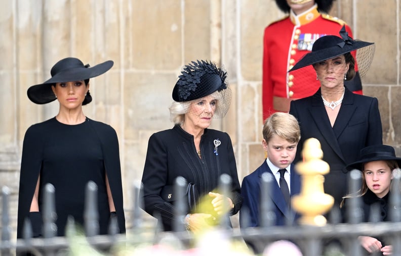 LONDON, ENGLAND - SEPTEMBER 19:  (L-R) Meghan, Duchess of Sussex, Camilla, Queen Consort, Prince George of Wales, Catherine, Princess of Wales, Princess Charlotte of Wales during the State Funeral of Queen Elizabeth II at Westminster Abbey on September 19