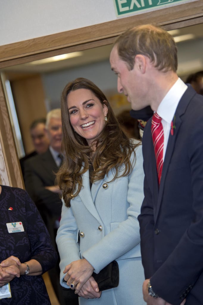 Expectant Kate flashed an adoring look at Will during a visit to the Pembroke Refinery in Wales in November.