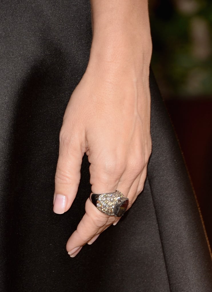 Sandra Bullock slipped a pretty megawatt diamond ring on her finger — a Lorraine Schwartz cocktail ring set with a 15-carat black diamond and surrounded by 10 carats of brown diamonds.