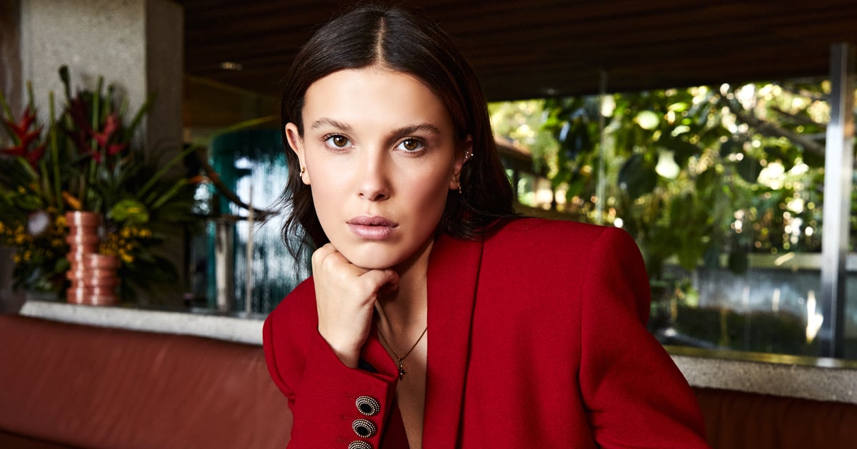 Millie Bobby Brown Wears a Red Micro Miniskirt For Essentia