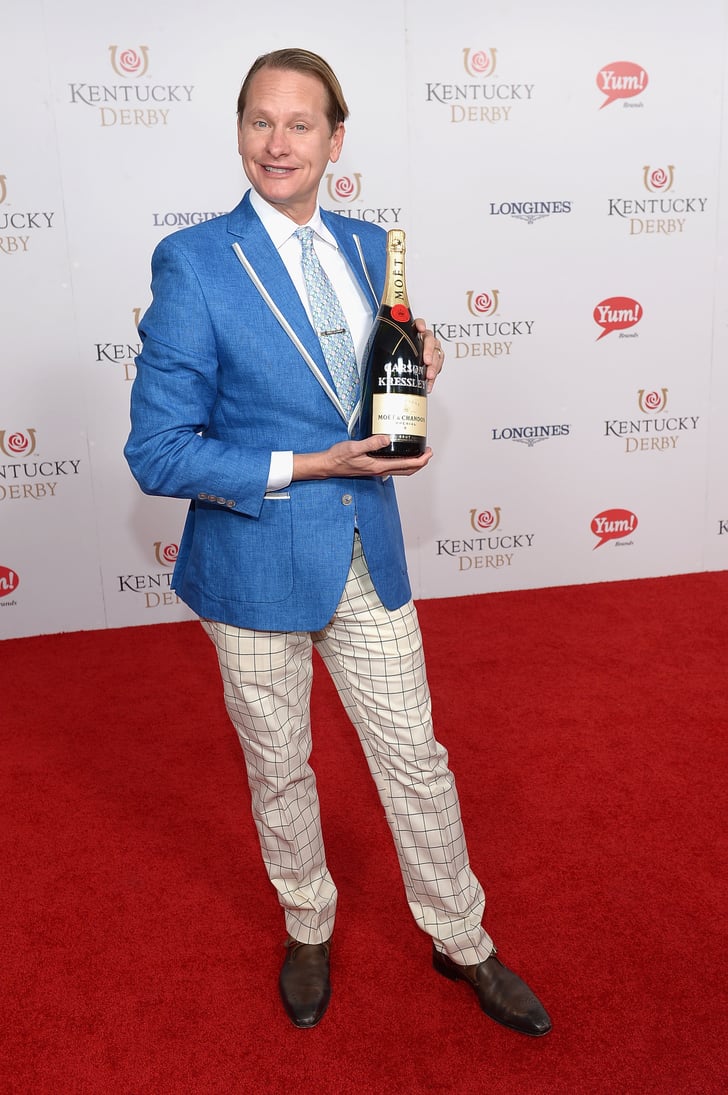 Carson Kressley struck a pose with a bottle of Champagne ...
