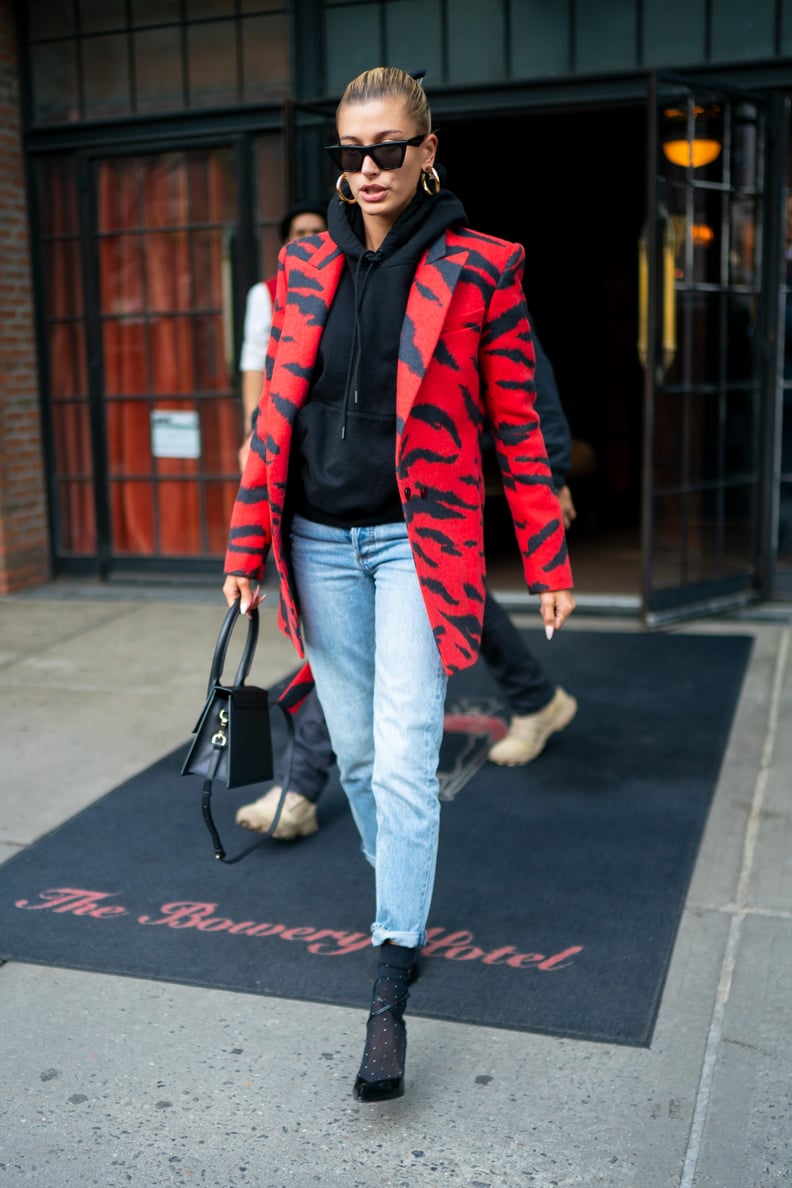 Hailey Baldwin Wearing an Animal Print Blazer Over a Hoodie With Polka-Dot Socks and Heels