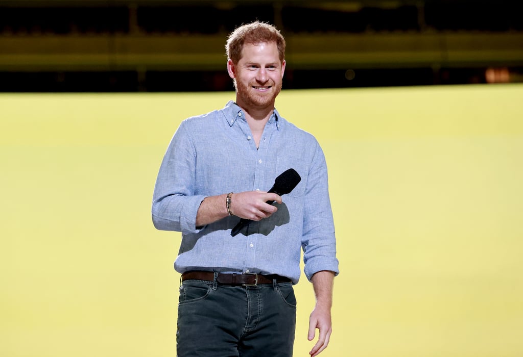 Prince Harry and Meghan Markle are doing their part to help people amid the COVID-19 pandemic. On Sunday night, Harry made his first public appearance since Prince Philip's funeral as he attended the taping of Global Citizen's VAX Live: The Concert to Reunite the World at the SoFi Stadium in LA. The couple are serving as Campaign Chairs of VAX Live — which "aims to inspire vaccine confidence worldwide and help get the COVID-19 vaccines to everyone, everywhere." 
Dressed casually in jeans and a button-down shirt, Harry gave an impassioned speech about "empathy and compassion" as he encouraged people to come together amidst the pandemic. "We are at a defining moment in the global fight against COVID-19. Tonight is a celebration of each of you here, the vaccinated frontline workers in the audience and the millions of frontline heroes around the world," he said in his speech. "You spent the last year battling courageously and selflessly to protect us all. You served and sacrificed, put yourselves in harm's way and with bravery, knowing the costs. We owe you an incredible depth of gratitude, thank you." 
"We must look beyond ourselves with empathy and compassion for those we know and those we don't."
He then directed his speech to everyone else, adding, "We're also coming together because this pandemic cannot end unless we act collectively with an unprecedented commitment to our shared humanity. The vaccine must be distributed to everyone, everywhere. We cannot rest or truly recover until there is fair distribution to every corner of the world. The mission in front of us is one we cannot afford to fail out, and that's what tonight is about. The virus does not respect borders, and access to the vaccine cannot be determined by geography. It must be accepted as a basic right for all, and that is our starting point." 
He ended his speech by asking people to look "beyond ourselves" to help people we know and don't know. "None of us should be comfortable thinking that we could be fine when so many others are suffering," he said. "In reality, and especially with this pandemic, when any suffer, we all suffer. We must look beyond ourselves with empathy and compassion for those we know, and those we don't. We need to lift up all of humanity and make sure that no person or community is left behind. What we do in this moment will stand in history, and tonight, we stand in solidarity with the millions of families across India who are battling a devastating second wave." 
See more pictures from his appearance at the event ahead, and be sure to tune in to full event when it airs on 8 May. 

    Related:

            
            
                                    
                            

            Harry and Meghan&apos;s First Netflix Series Has Been Revealed, and It&apos;s Already My New Favourite Show
