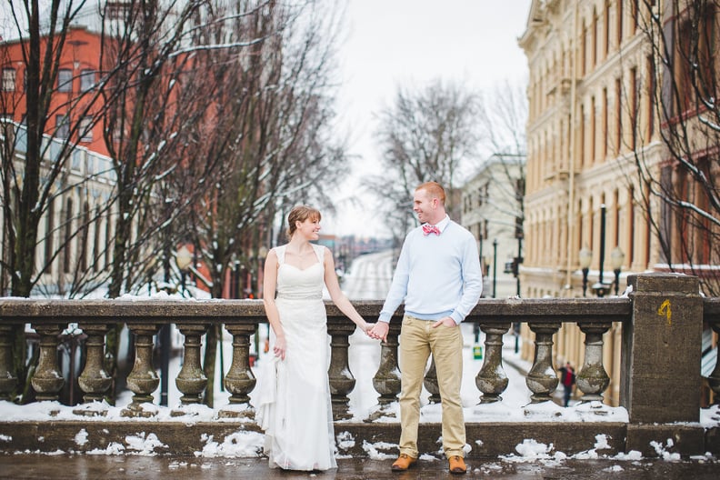 A snowy background will look dashing against your dress.