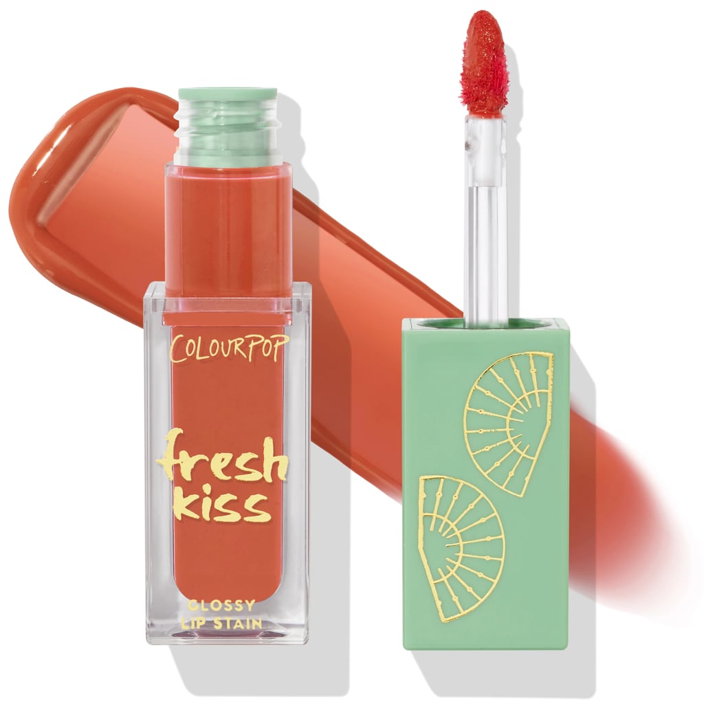 A Coral Pink Lip Stain: Fresh Kiss Glossy Lip Stain in Sealed With A Kiss