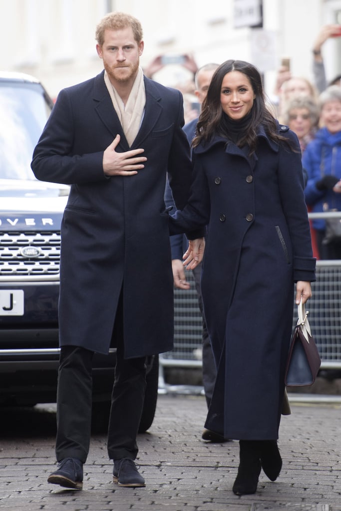 Meghan Markle Matched Prince Harry in Her Navy Mackage Coat