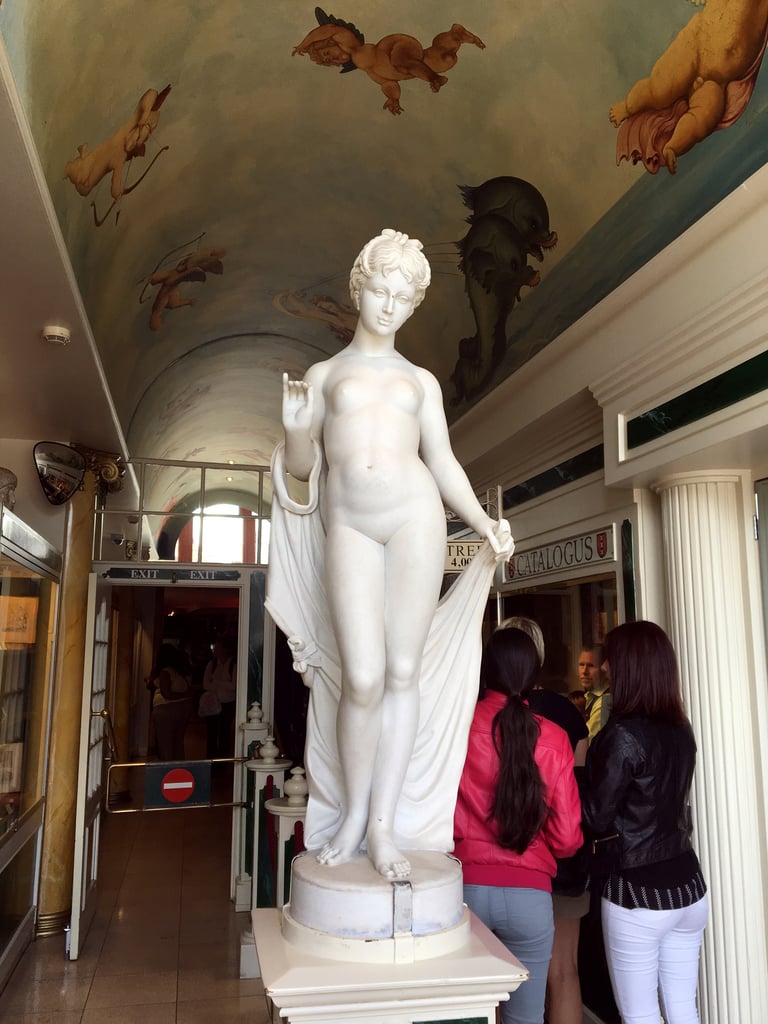 A welcoming statue of Venus greets you at the entrance.