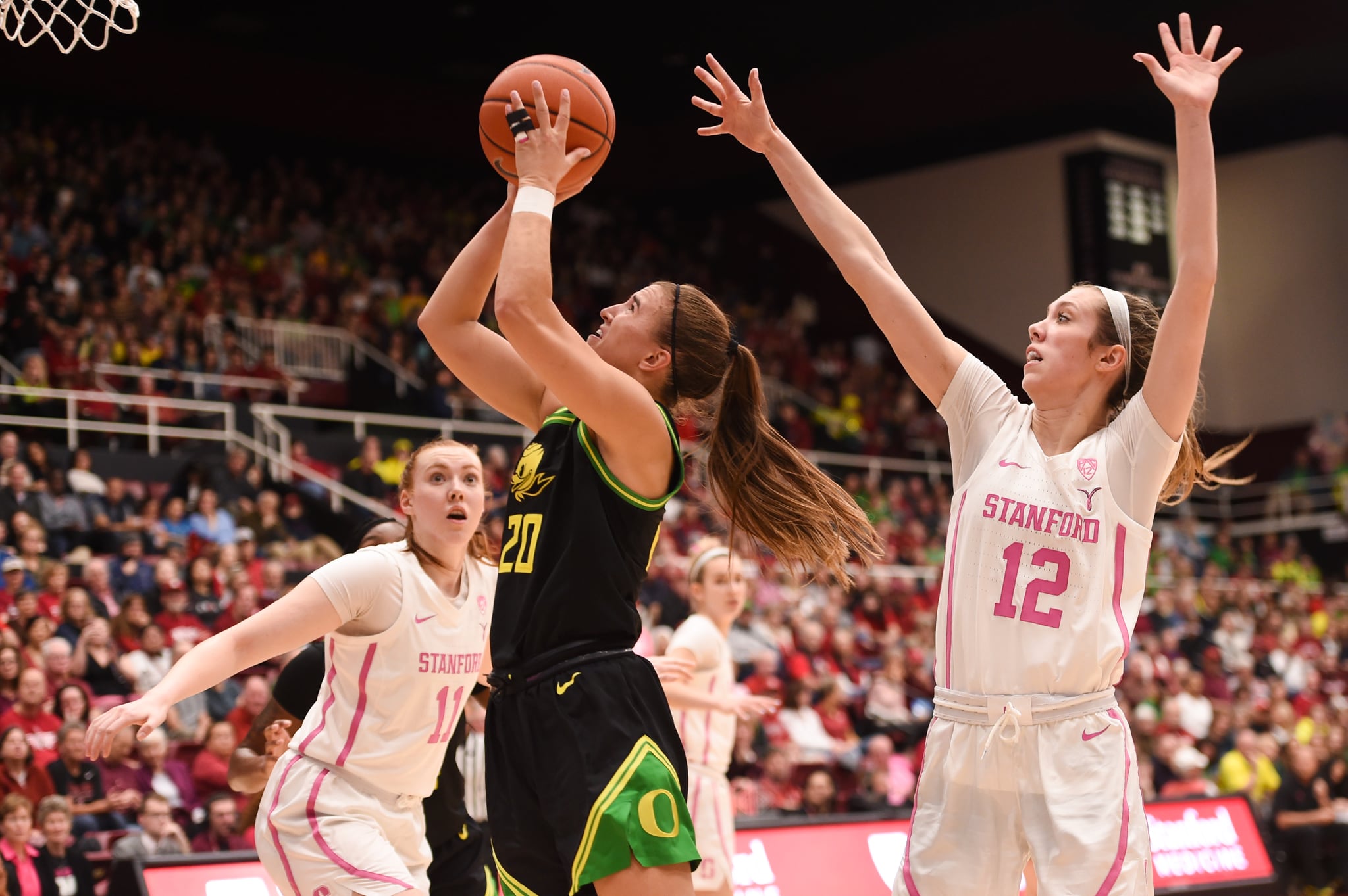 PALO ALTO, CA - FEBRUARY 24: Oregon Ducks guard Sabrina Ionescu (20) shoots over Stanford Cardinal guard Lexie Hull (12) during the NCAA women's basketball game between the Oregon Ducks and the Stanford Cardinal at Maples Pavilion on February 24, 2020 in Palo Alto, CA. (Photo by Cody Glenn/Icon Sportswire via Getty Images)