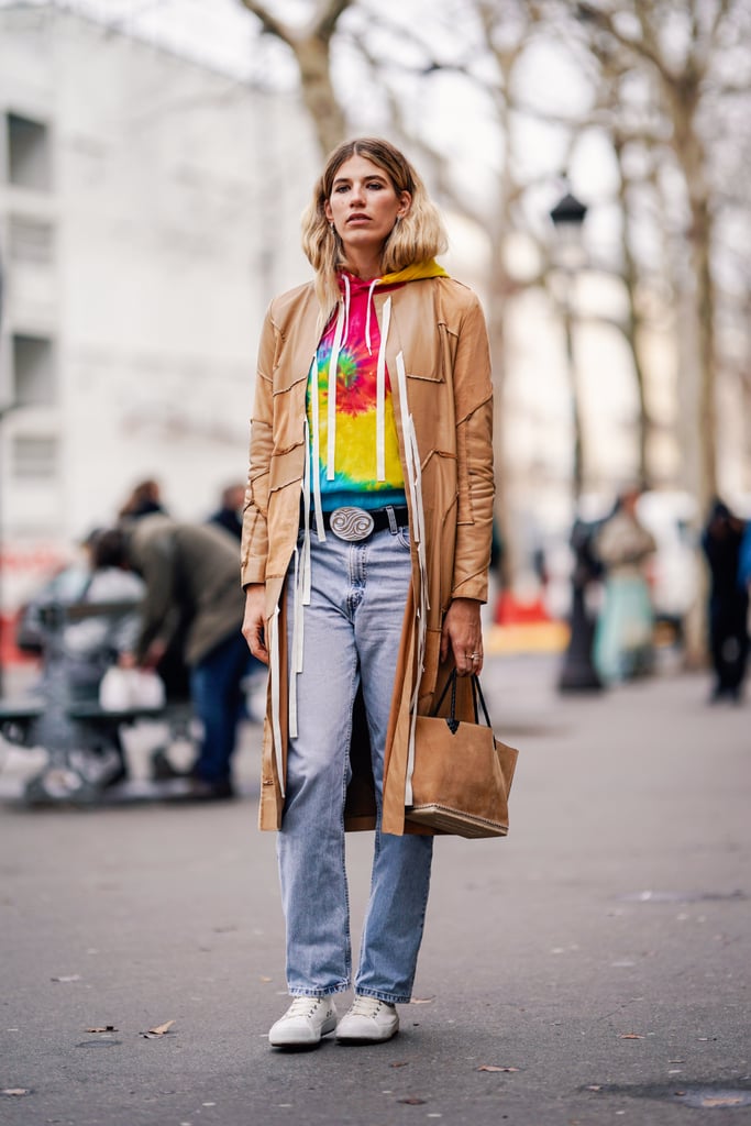 Style a tie-dye hoodie with a relaxed trench.