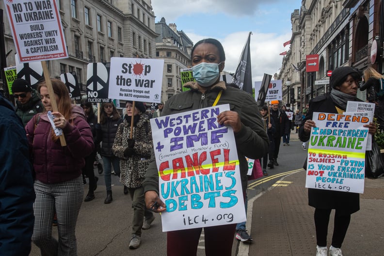 LONDON, ENGLAND - MARCH 6: The protest called by the Stop the War Coalition makes its way from BBC Broadcasting House towards Trafalgar square on March 6, 2022 in London, England. Russia invaded neighboring Ukraine on 24th February 2022, its actions have 