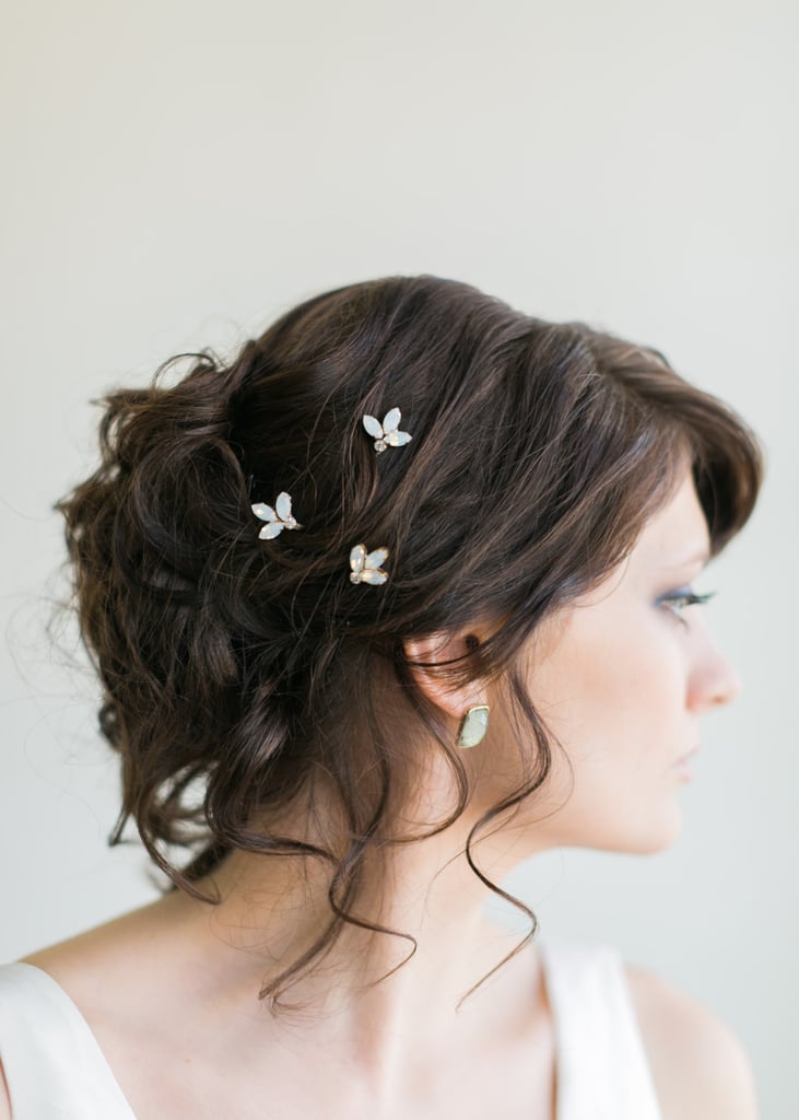 Leave the black bobby pins at home in favor of these shimmery white opal and crystal rhinestone pins ($65).