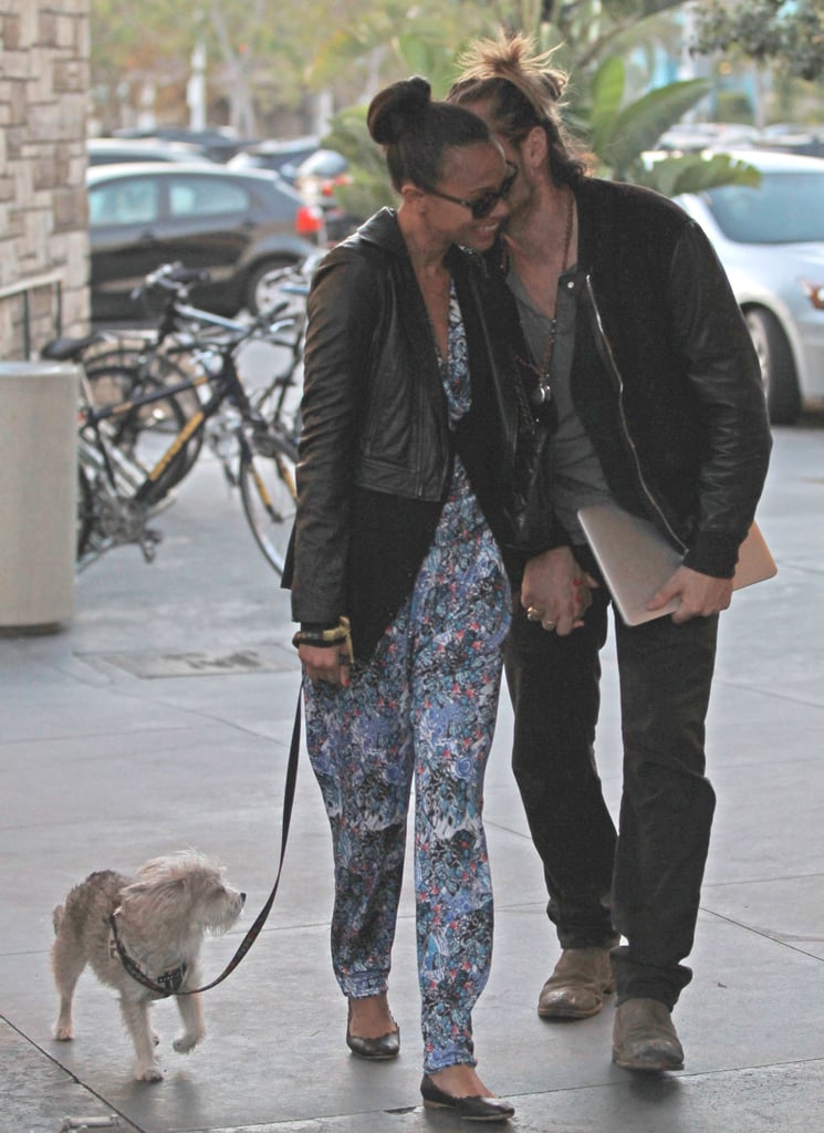 Marco snuck in a kiss as he and Zoe walked their dog in October 2013.