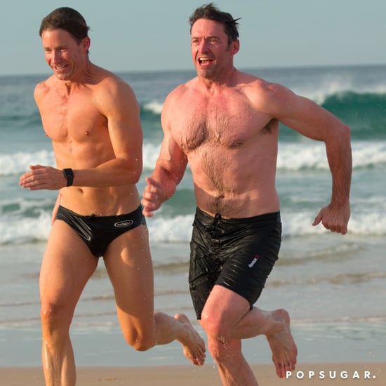 Hugh Jackman on the Beach With His Trainer August 2017