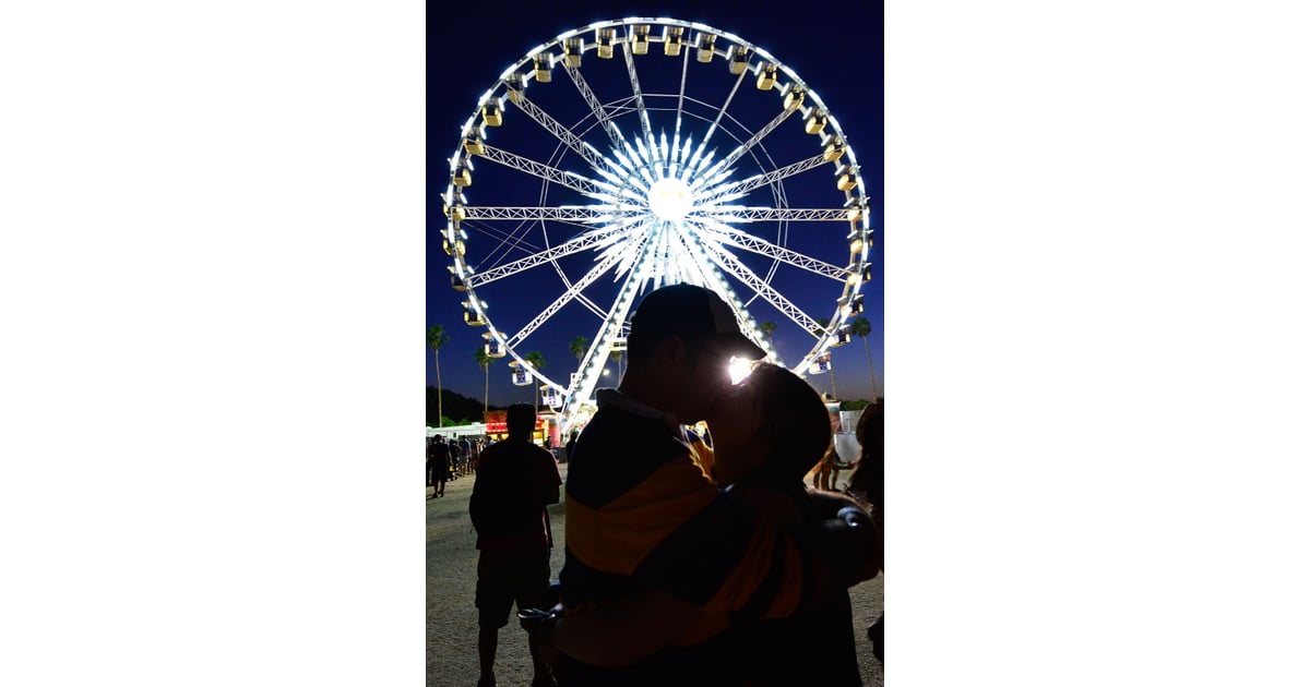 A Couple Got Kissy In Front Of The Ferris Wheel At Stagecoach Cute Couples At Summer Music 9262