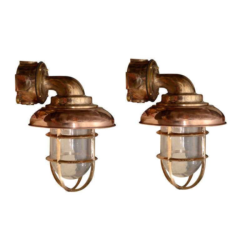 This set of eight Copper and Brass Nautical Sconces ($800 ...