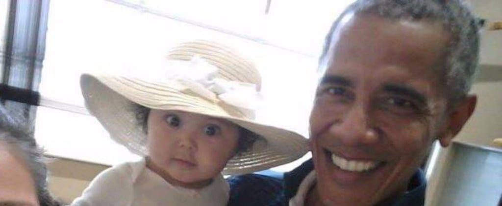 Barack Obama Holding Baby at Anchorage International Airport