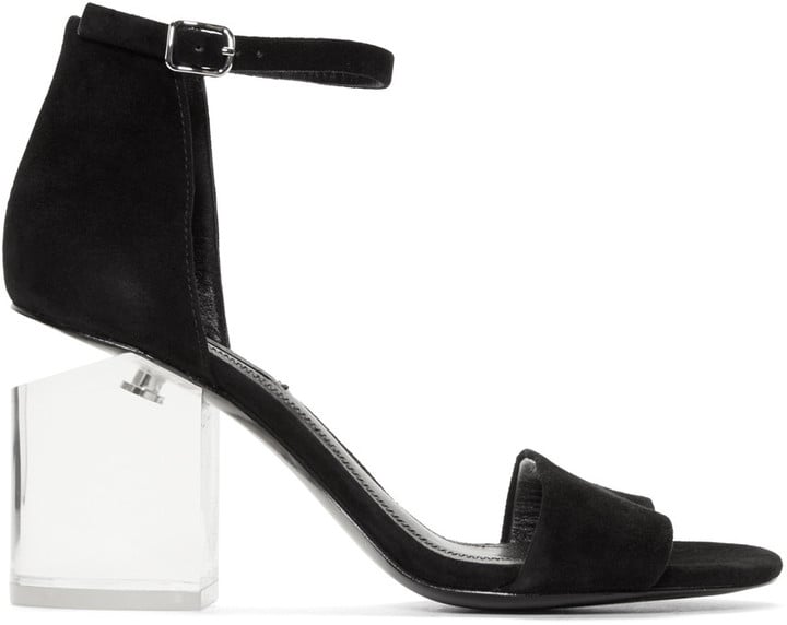 Upon first glance, the Alexander Wang Black Lucite Abby Sandals ($495) look like regular block heels, but turn the Lucite heel to the side and the compliments will be flying in.