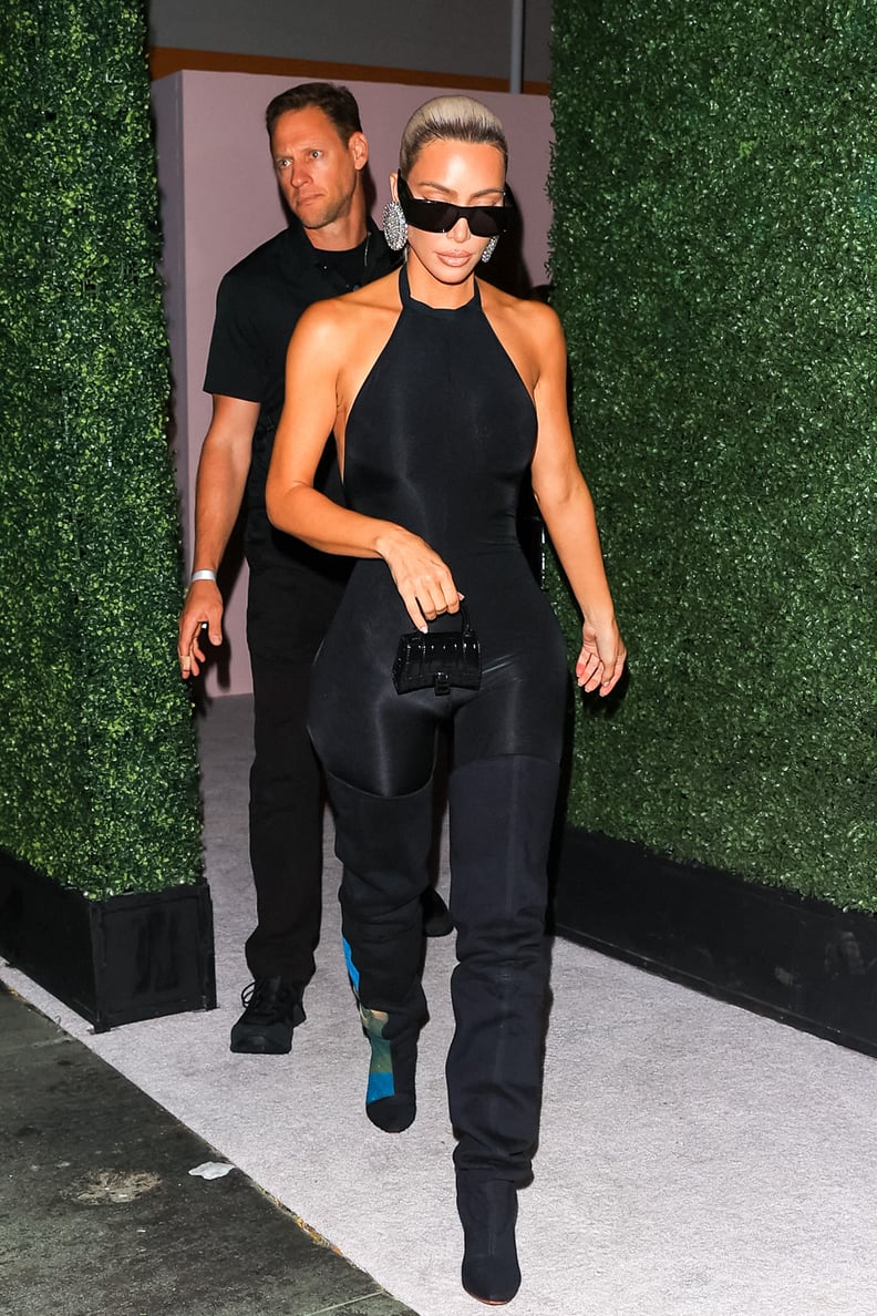 Khloe Kardashian in a Skims Black Jelly Sheer Full Bodysuit and
