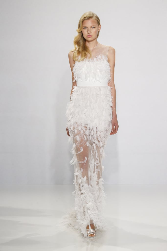 Feather appliqué column gown.