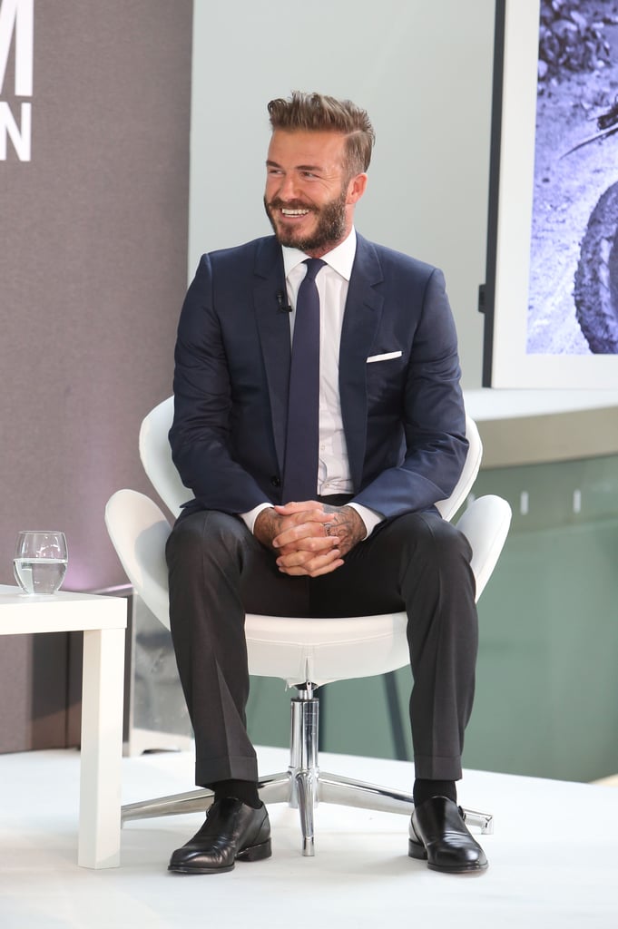 David Beckham laughed at a photocall for Into the Unknown in London on Monday.