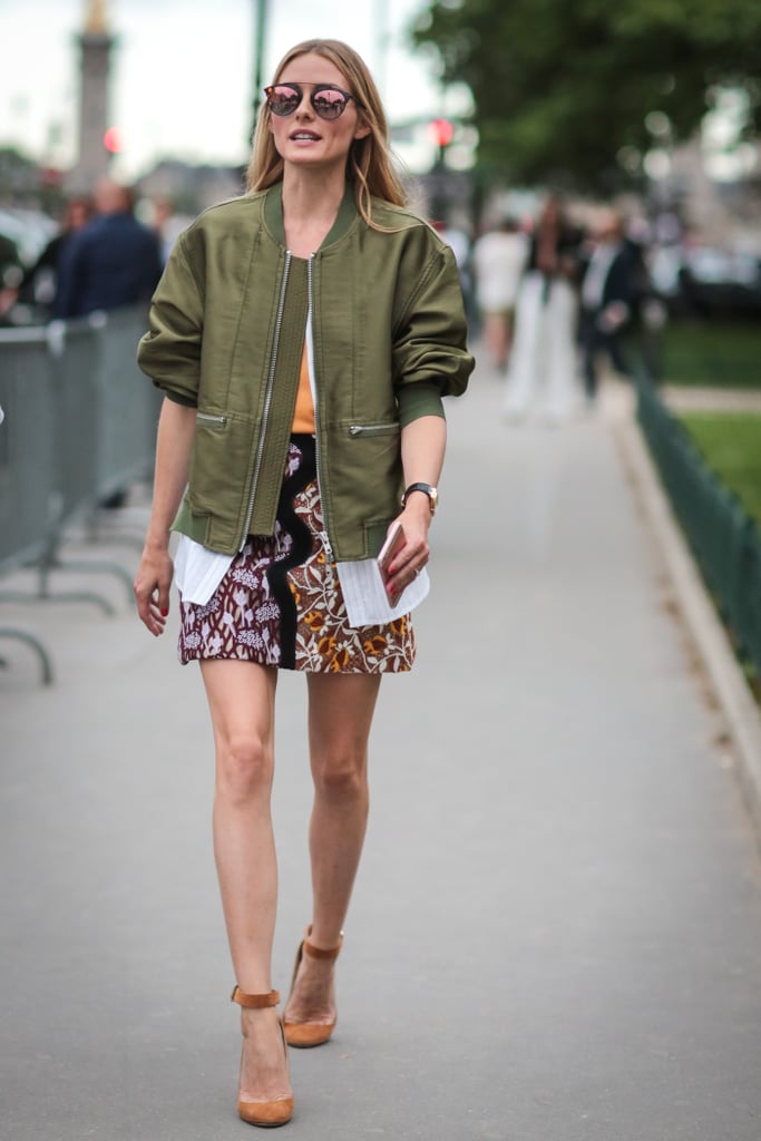 Hack: Unbutton your white top beneath a shorter bomber jacket to add some feminine pleating to your look and break up a busy print. Push up your sleeves when it's warm.