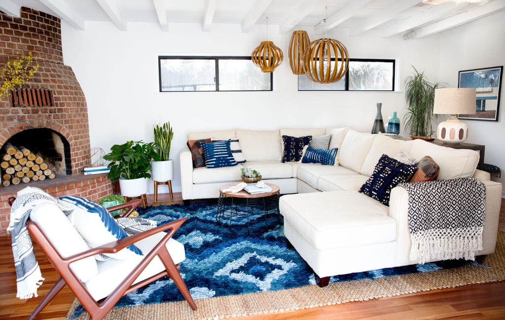 Amongst Jamie's favorite new pieces of decor are the mid-century planters, the beautiful vases near the fireplace, and the graphic shag rug.