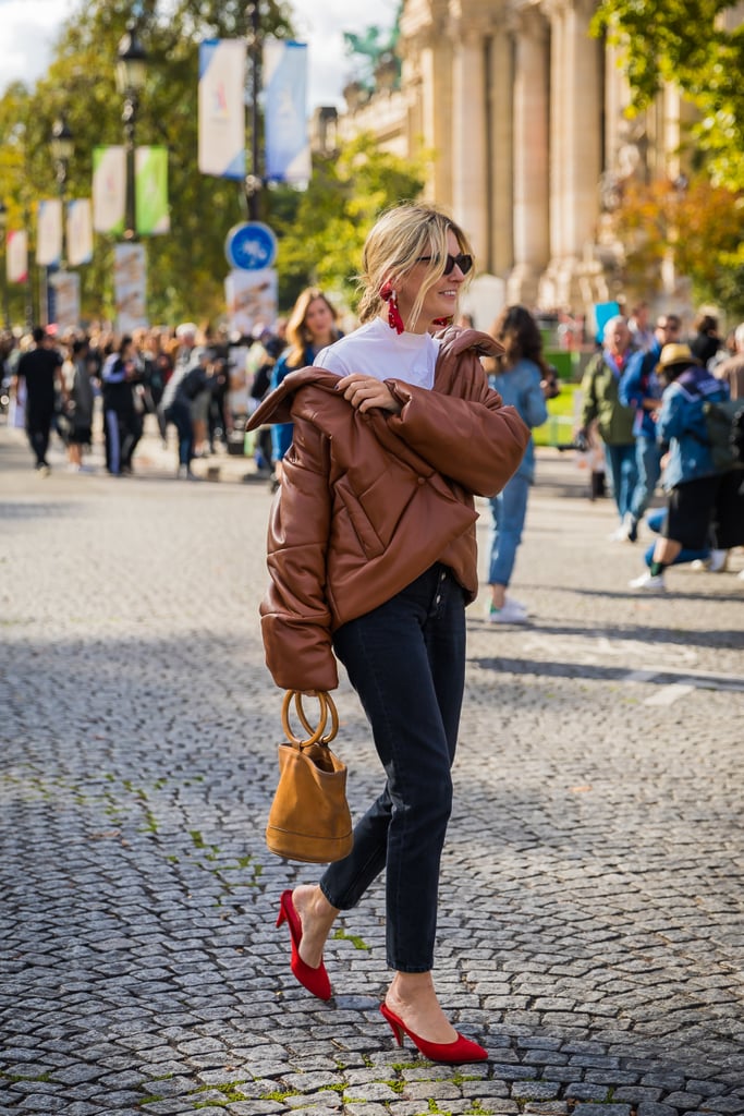 Camille Charrière shows us the most chic way to wear a puffer jacket.