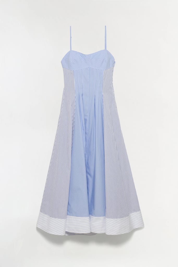 SIMKHAI Chamberlain Cotton Midi Dress ($273, originally $545)
SIMKHAI offers so much more than just a breezy summer sundress when it comes to the brand's versatile range. Whether you're shopping for an event or everyday basics that are classic with a twist, you won't regret picking up something you really love (that you might've been eyeing last season) for up to 50 percent off.