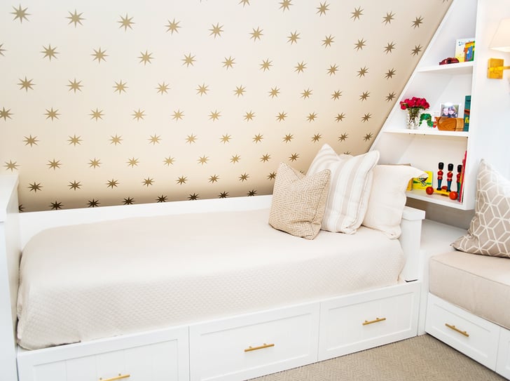 By using this Osborne & Little wallpaper on the sloping walls, Kid