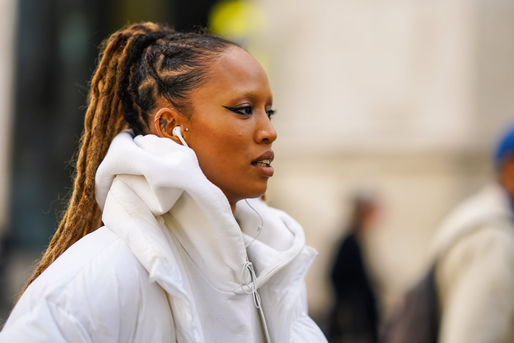 PARIS, FRANCE - OCTOBER 01: A guest wears a white hooded sweatshirt, outside Chloe, during Paris Fashion Week - Womenswear Spring Summer 2021, on October 01, 2020 in Paris, France. (Photo by Edward Berthelot/Getty Images)