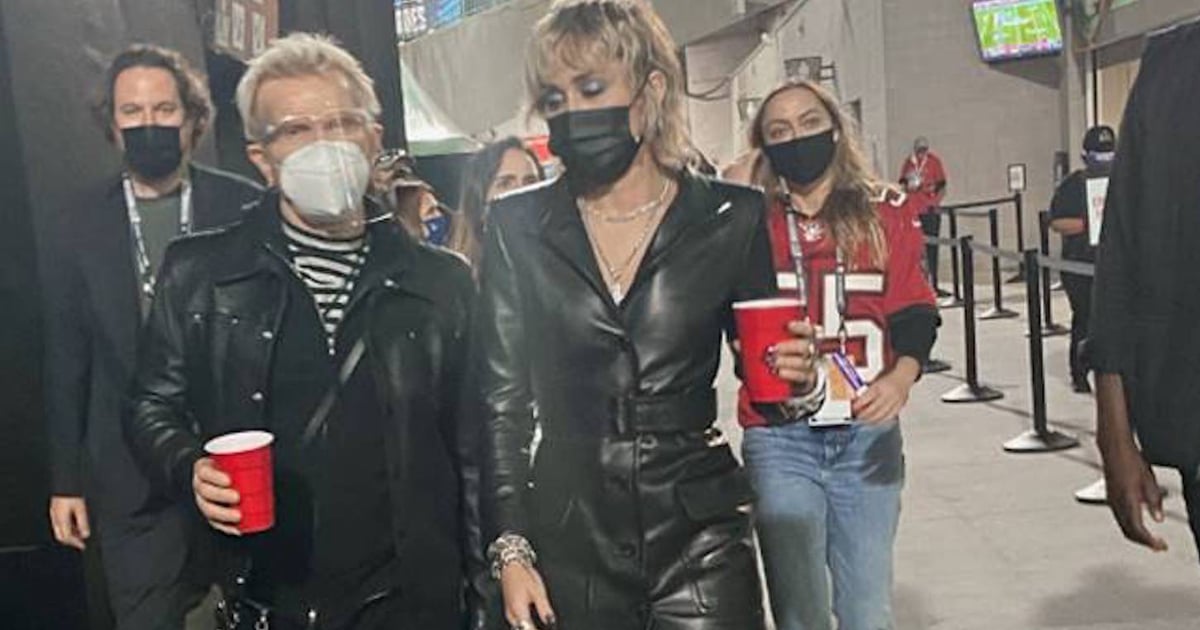 Miley Cyrus Watched the Super Bowl Wearing This Sexy Leather Jacket as a Dress