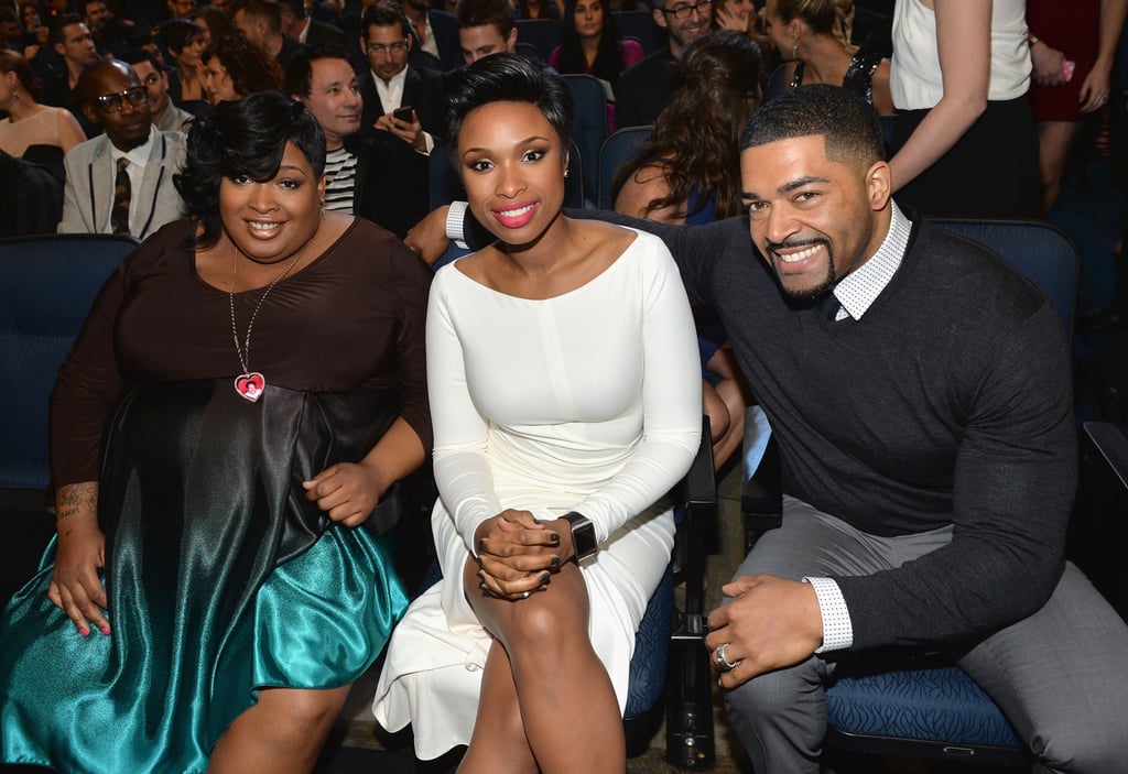 Jennifer sat in the front row with her sister, Julia, and husband David Otunga.