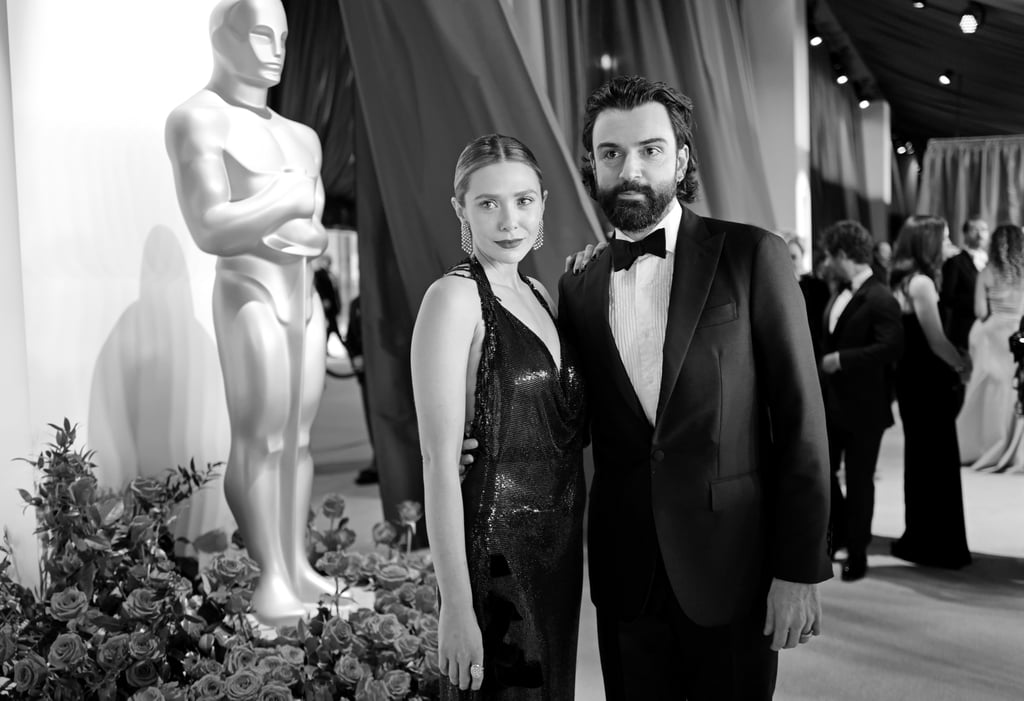 Elizabeth Olsen and Robbie Arnett at 2023 Oscars