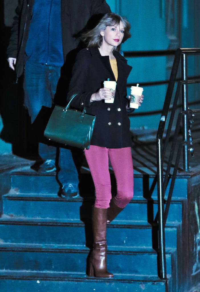 On Thursday, Taylor Swift held her Starbucks cups tightly ...