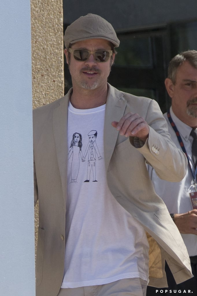 Brad Pitt Wears Homemade Shirt at Airport in France | Photos