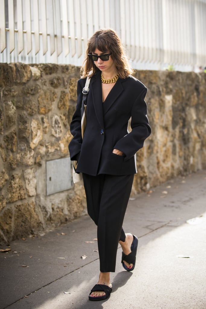 A Black Suit and Coordinating Black Slides Is Understated but Not ...