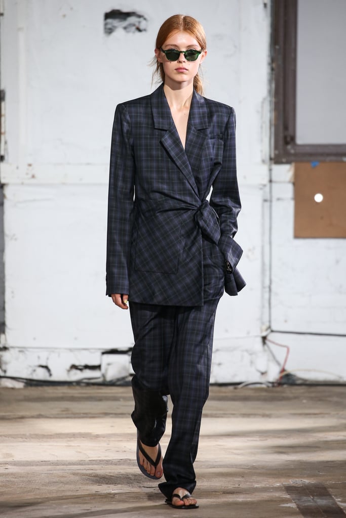A model at the Tibi show pairing with a plaid suit.